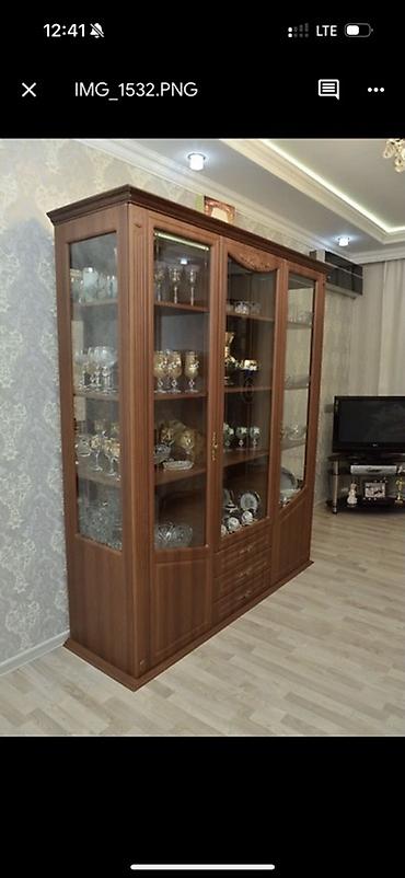 Şüşəli dolab vitrini, İşlənmiş, Ünvandan götürmə