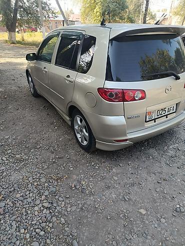 айни 95: Mazda Demio: 2005 г., 1.5 л, Автомат, Бензин, Хэтчбэк — 10
