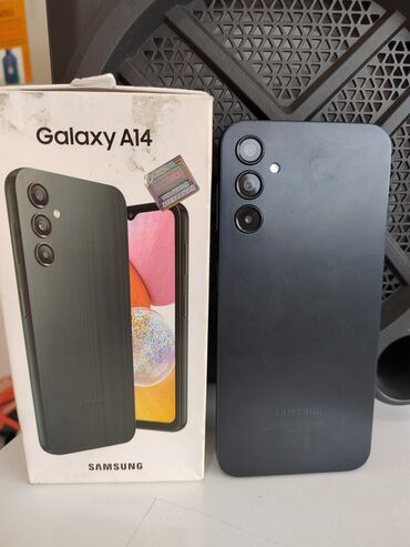 Мобильные телефоны и аксессуары: Samsung Galaxy A14, 64 ГБ, цвет - Черный, Кнопочный, Отпечаток пальца, Face ID