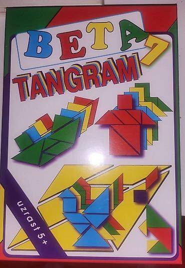 polovne igracke za decu: Sadržaj: 28 delova za tangram i 19 šema različitih predmeta i bića i — 1