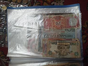 Монеты: Коллекция монет и банкнот России Состав: - Альбом «Памятные монеты — 29