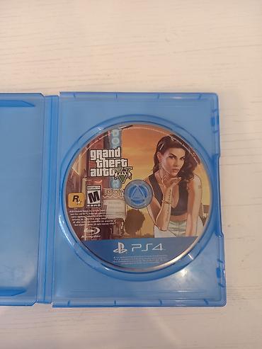 TV və video: PS4 Konsolu Üçün "GTA 5" Oyun Diski Satılır. Diskin xarici tərəfi — 3