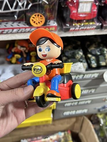 chery very: Игрушка «Мальчик на трёхколёсном велосипеде» - Яркая пластиковая — 1