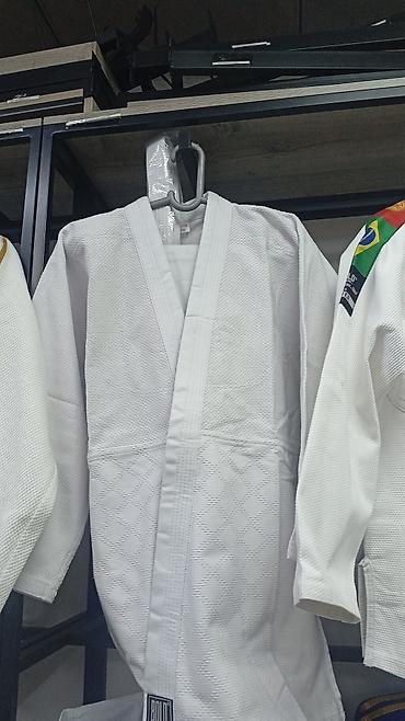 Спортивные костюмы: Кимоно Новые .для дзюдокарате, таэквондо оригинал в наличии — 2