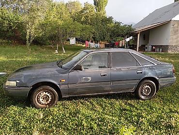 rox 01: Mazda 626: 1990 г., 2.2 л, Механика, Седан — 2