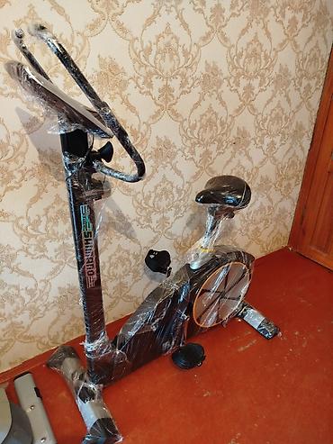 irşad electronics segway: SHIMBAGO markalı, qara rəngli velotrenajor. Üfüqi vəziyyətdədir və — 2