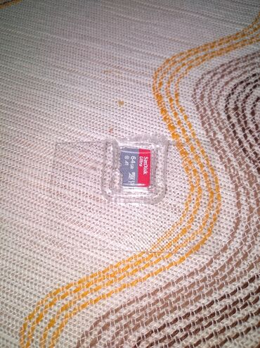 sd card: Micro SD Card 64 GB Sandisk yeni ve orginaldi Metrolara catdirilma