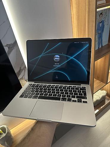 macbook pro 2017 i5: Macbook Pro 13 inch early satılır. Prosessor 2,7 GHz iki nüvəli İntel — 1