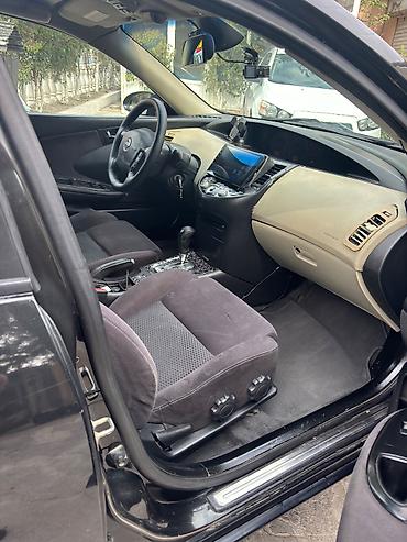 Транспорт: Nissan Primera: 2 л | 2005 г. Седан — 2
