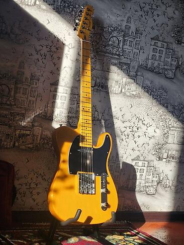 обучение гитаре: Электрогитара в стиле Telecaster, цвет Butterscotch Blonde с чёрным — 1