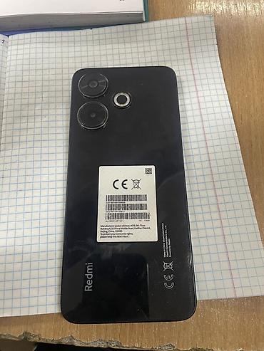 Мобильные телефоны: Смартфон Redmi 13, 128 ГБ. Характеристики по устройству: - Модель — 2