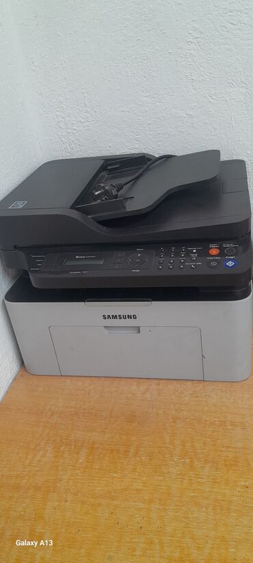 где можно взять ноутбук в рассрочку: Samsung Xpress M2070FW принтери — бул монохромдуу лазердик көп