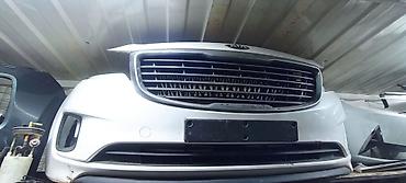 Передний бампер в сборе для Kia (эмблема KIA на решётке). Комплект