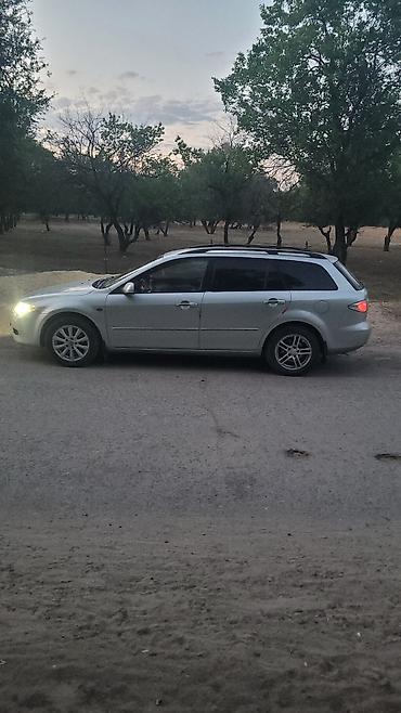 vw bora: Mazda 6: 2003 г., 2.2 л, Автомат, Газ, Универсал — 3