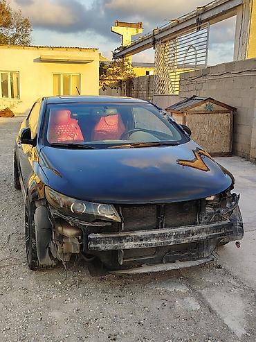 Marka/model: 2 qapılı kupe, qara rəng Kuzov: ön bamper, radiator