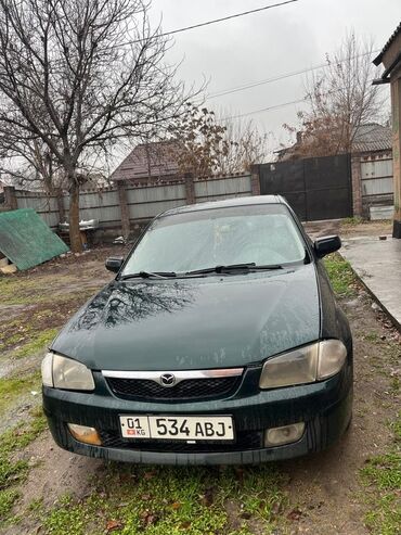 решетка радиатора гольф 3: Mazda : 1999 г., 1.5 л, Автомат, Бензин, Хэтчбэк