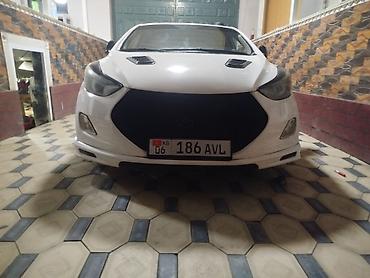 Тюнинг: Hyundai Elantra, белый седан с обвесом и тюнингом экстерьера — 3