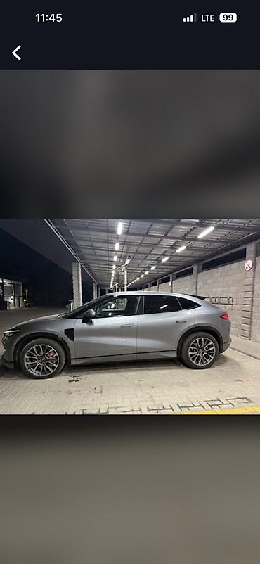 сколько стоит tesla: Электромобиль кросс-купе, серый металлик Основные особенности: - — 2