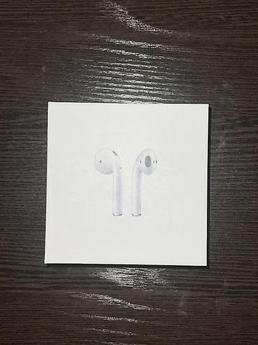 Аксессуары для мобильных телефонов: Apple AirPods with Wireless Charging Case (модель A2031/A2032, кейс — 1