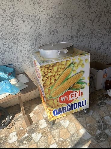 kafe aparati: Qarğıdalı bişirmə və satış aparatı. Təkərli konstruksiyaya malikdir — 1