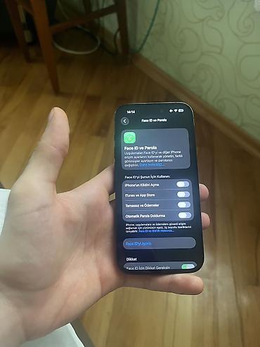 təcili iphone: IPhone 14 Pro, 128 GB, Black Titanium, Barmaq izi, Simsiz şarj, Face ID — 4