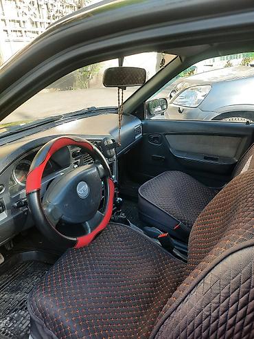 Daewoo Nexia: 2011 г., 1.6 л, Механика, Седан