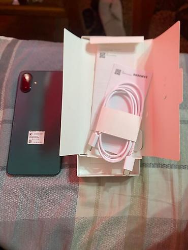 Мобильные телефоны и аксессуары: Samsung Galaxy A07 (модель SM-A075F/DS), цвет зелёный. Основные — 4