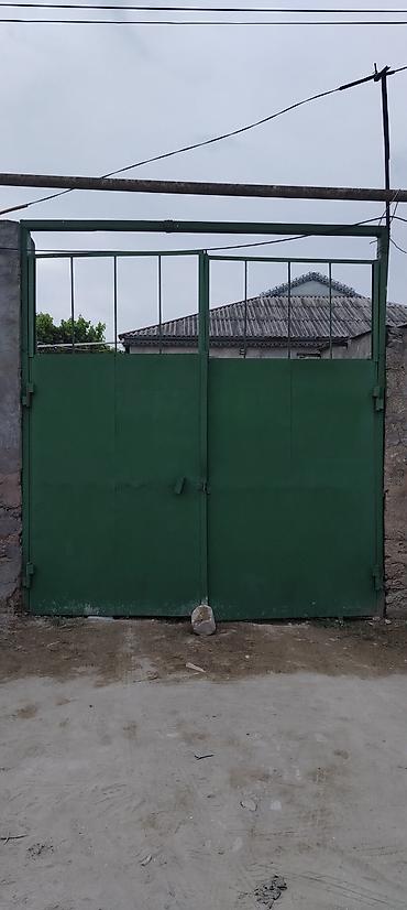 Həyət darvazaları: Məhsul: Dəmir darvaza (ikiqanadlı) Təsvir: - Material: qalın metal — 1