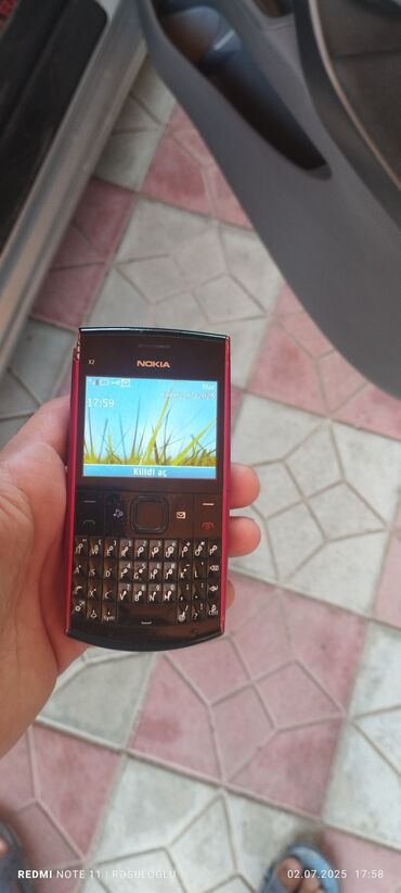 telefon zəngi üçün mp3 yukle: Nokia X2 Dual Sim, rəng - Qırmızı, Düyməli