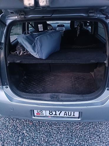 авто зикир: Daihatsu Sirion: 2008 г., 1.5 л, Механика, Бензин, Хэтчбэк — 8
