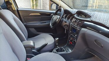 Avtomobil salonu üçün digər detallar: Dongfeng S30 sedan – komfortlu və geniş salon . Tecili satilir — 6