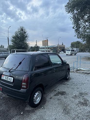 муравей с бензином: Daihatsu Cuore: 2001 г., 1 л, Механика, Бензин, Купе — 5