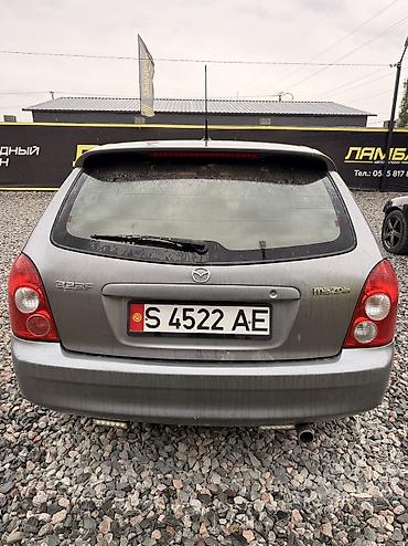 mazda 2000: Mazda 323: 2002 г., 1.6 л, Механика, Бензин, Хэтчбэк — 5