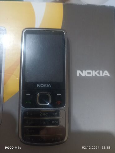 масла телефон: Nokia 6700 Slide, Колдонулган, түсү - Күмүш, 1 SIM