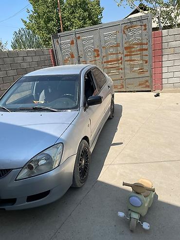 kia moning: Mitsubishi Lancer: 2003 г., 1.3 л, Механика, Бензин, Седан — 4