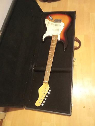 Gitare: Električna gitara tipa Stratocaster u sunburst finišu, sa belim — 2