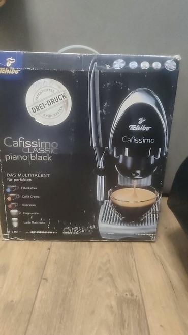 Капсульная кофемашина Tchibo Cafissimo Classic, цвет Piano Black