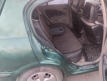 зил урал: Nissan Almera Classic: 2001 г., 1.5 л, Механика, Бензин, Хэтчбэк — 9