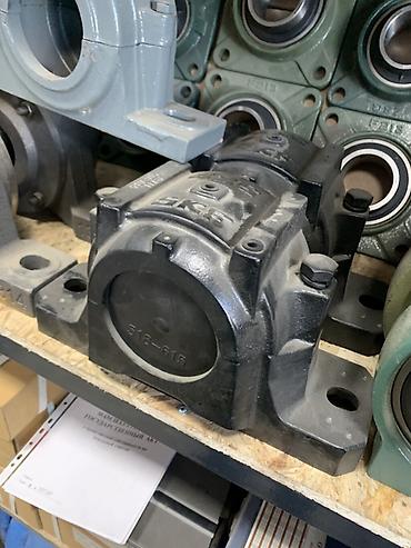 518: Корпусной подшипниковый узел SNR/SKF типа SN/SNL (разборный, на лапах) — 2