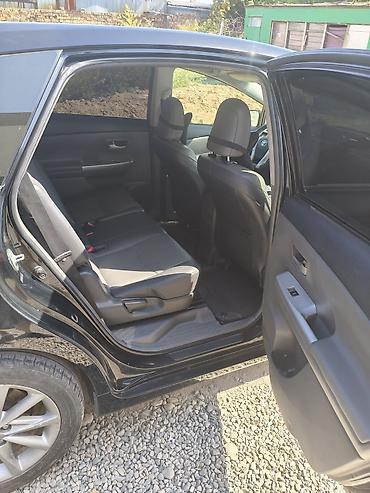 byd e2 2025: Toyota Prius V: 2012 г., 1.8 л, Гибрид, Универсал — 5