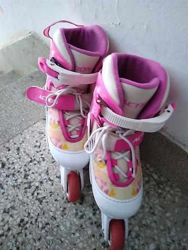 Roleri Action roze podesivi br. 30-33, sa pertlama i silikonskim
