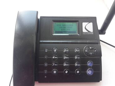 zte axon: Продаю телефонный аппарат с городским номером беспроводной. Зарядка