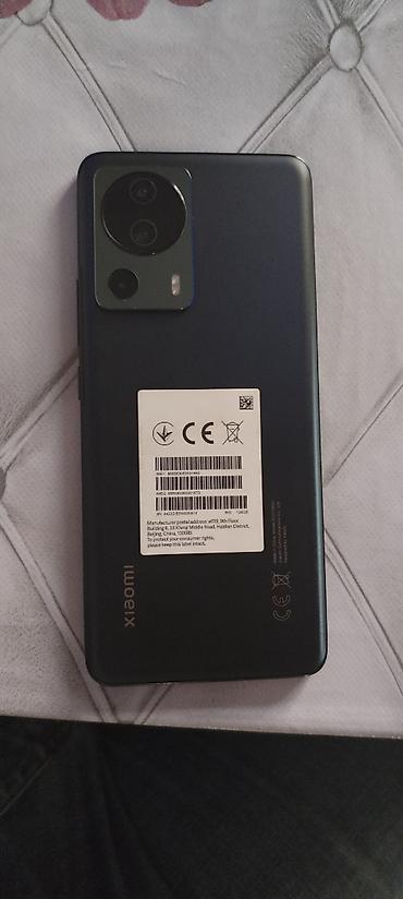 телефон fly fs521 power plus 1: Xiaomi 13 Lite, 128 ГБ, цвет - Черный, 
 Две SIM карты — 1