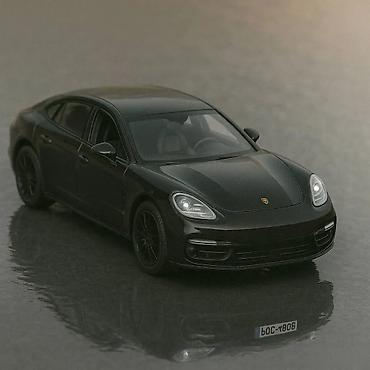 plavi sat: Porsche panamera midnight black ekskluzivni model vozila. porsche — 1