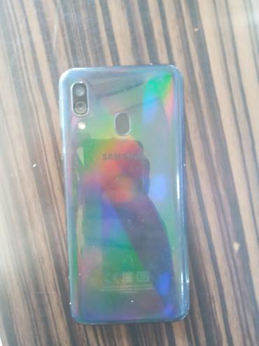 m12 samsung: Samsung Galaxy A40, 64 GB, Face ID, Simsiz şarj, İki sim kartlı — 2