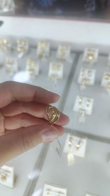 amber elixir: Золотое кольцо-перстень с плавными переплетающимися линиями 585 2.16гр — 1
