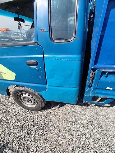 hyundai пикап: Hyundai Porter — малотоннажный бортовой грузовик, синий цвет кузова — 4