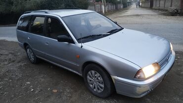 машина экономичный: Nissan Primera: 1991 г., 2 л, Механика, Дизель, Универсал