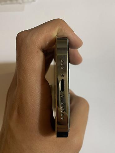 iphon 10: IPhone 14 Pro, 128 GB, Rose Gold, Face ID, Simsiz şarj — 5