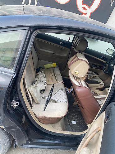 1998: Volkswagen Passat: 1.8 l | 1998 il Sedan — 3